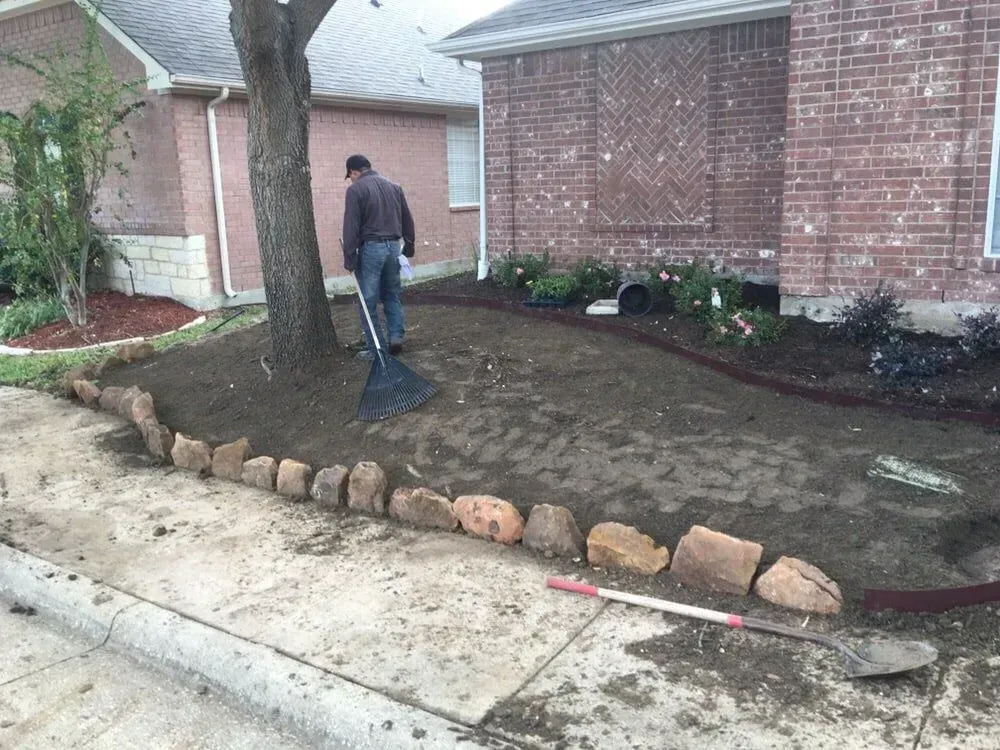 Residential yard being prepared for new landscape work
